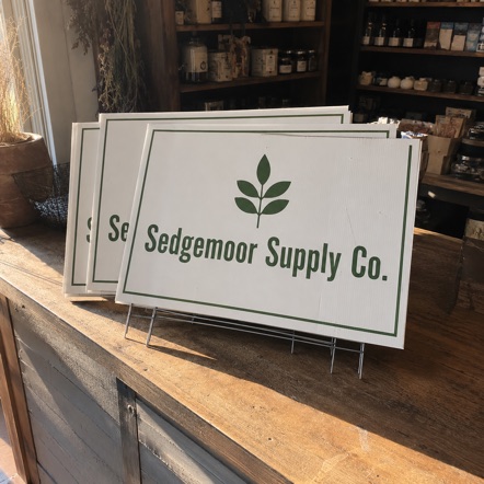 Branded campaign signs with logo